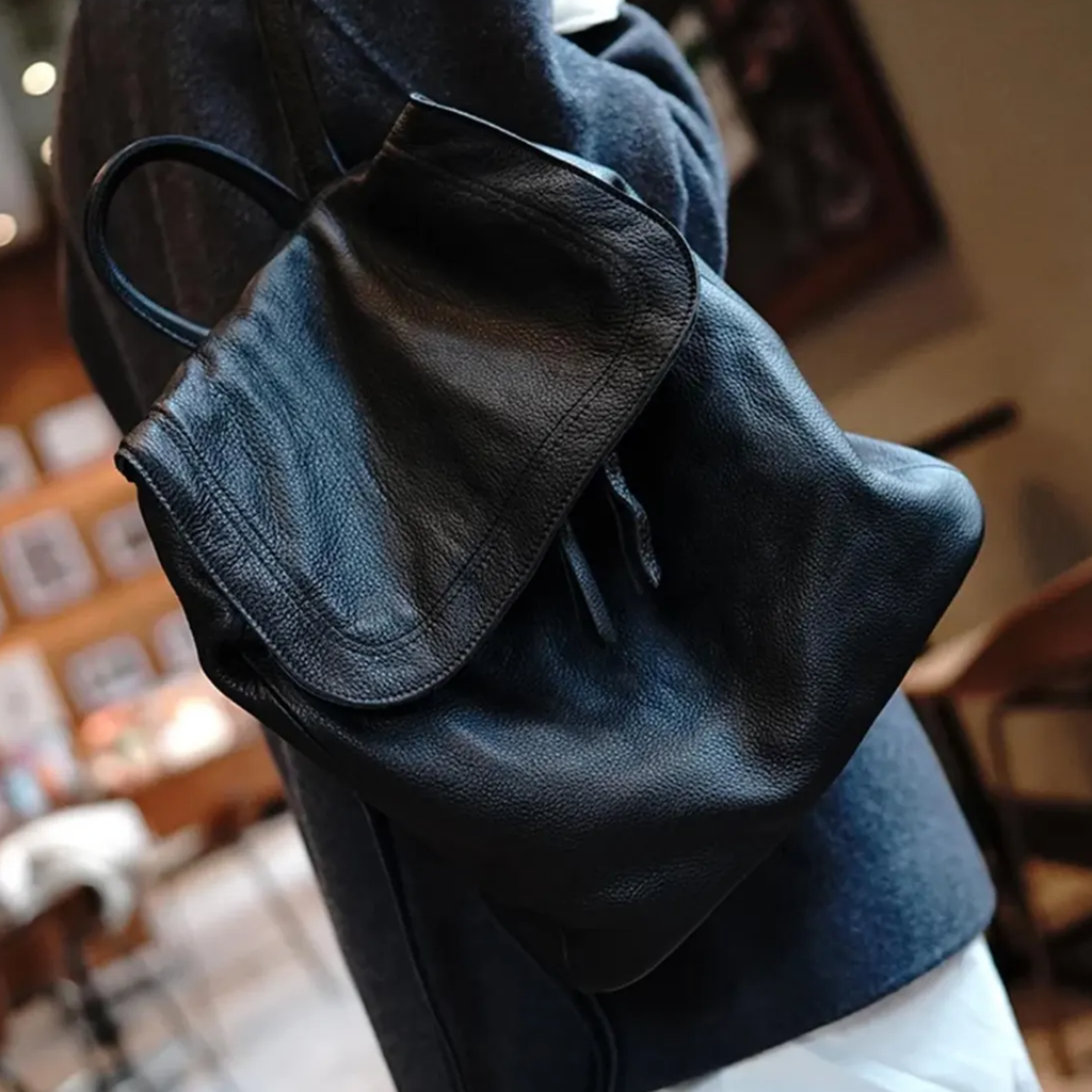 Soft Rectangular Large Backpack With Overlapping Front Flap, Curved Top Hand Loop And Vertical Side Zip Pocket