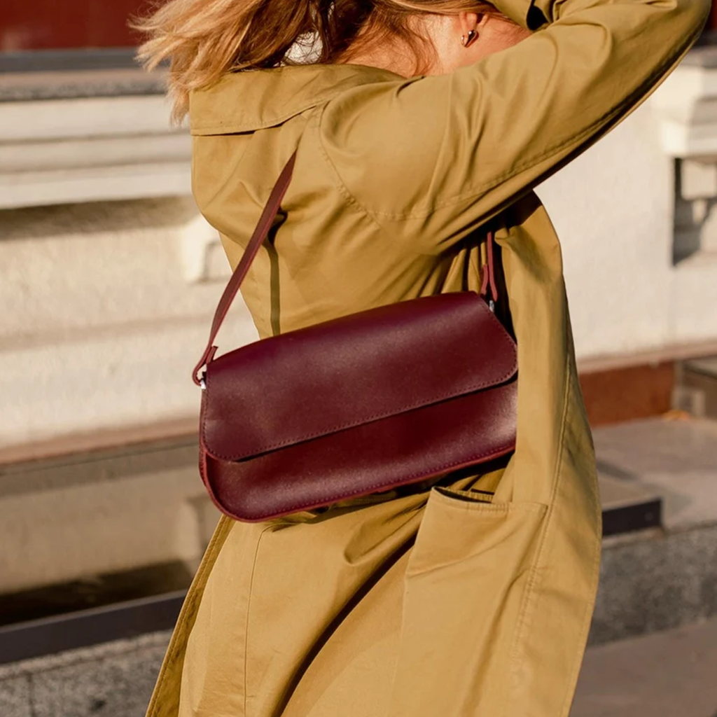 Deep Burgundy Slim Elongated Rectangular Shoulder Pouch With Wide Stitched Overlay Flap And Single Matching Shoulder Hanging Strap