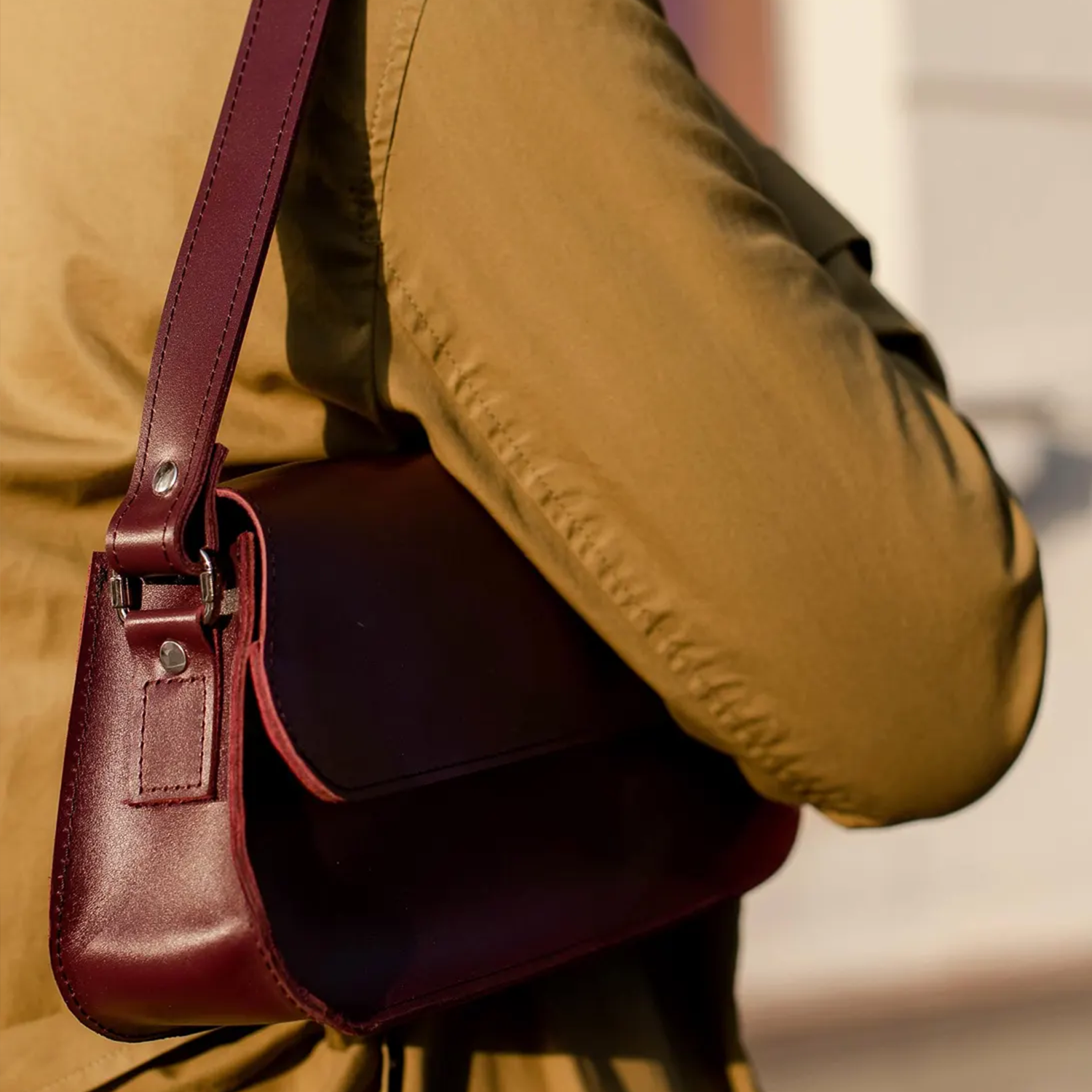 Deep Burgundy Slim Elongated Rectangular Shoulder Pouch With Wide Stitched Overlay Flap And Single Matching Shoulder Hanging Strap