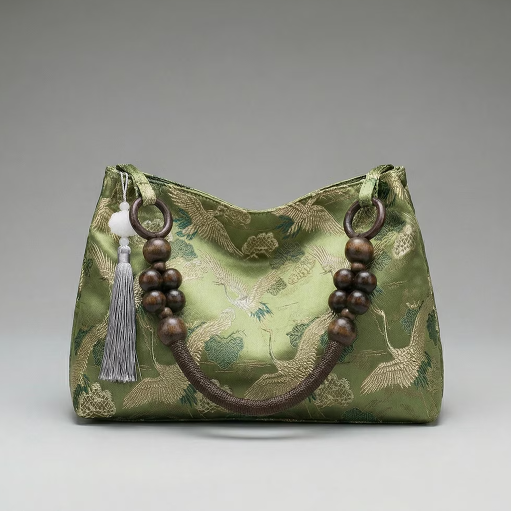 Multi-Tone Crane Embossed Curved Hobo Pouch With Wooden Bead Carry Frame, Jade Accent Tassel And Inner Zipper Divided Pocket