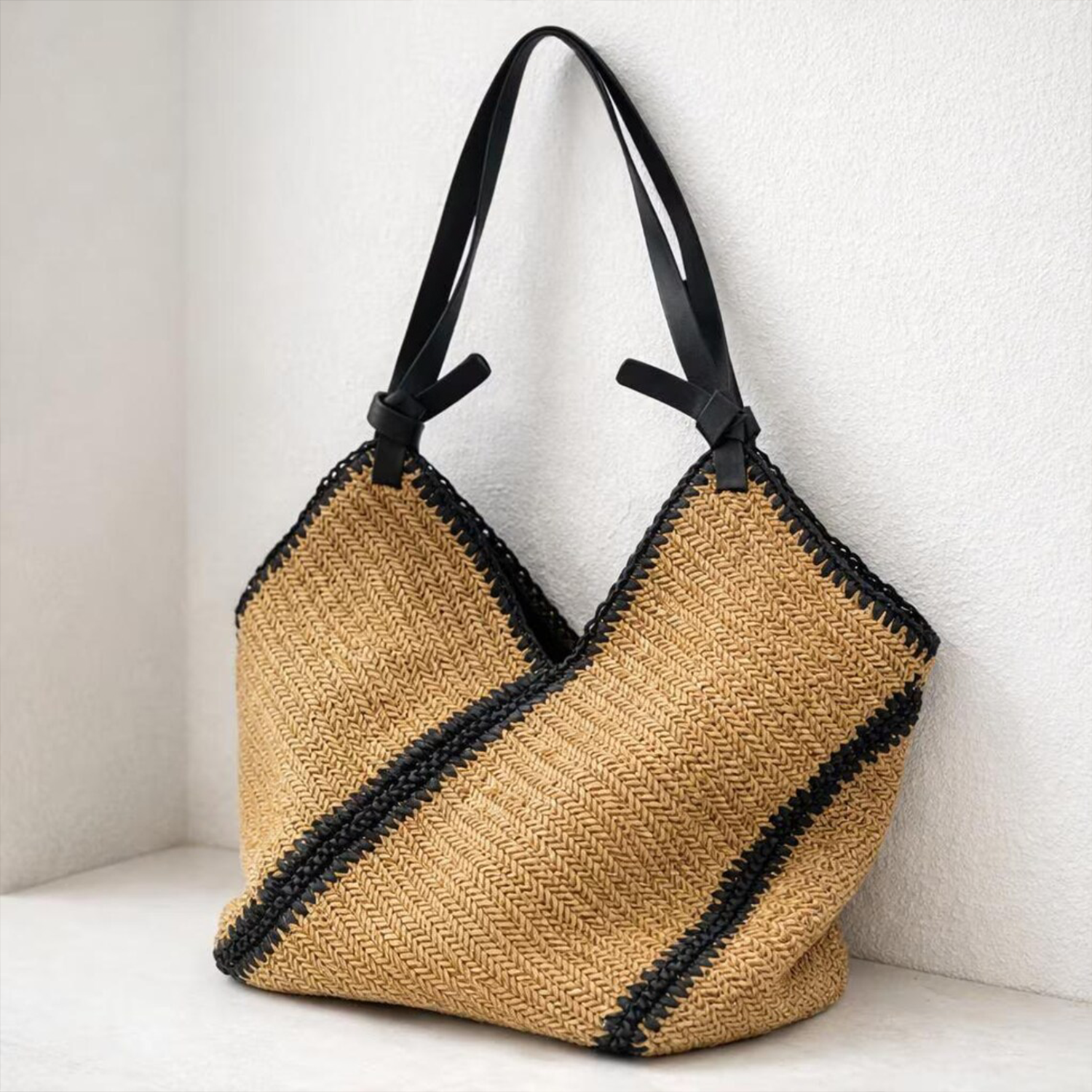 Natural Herringbone Woven V-Shape Oversized Tote With Diagonal Black Contrast Stripe Trim And Knotted Black Shoulder Carry Straps